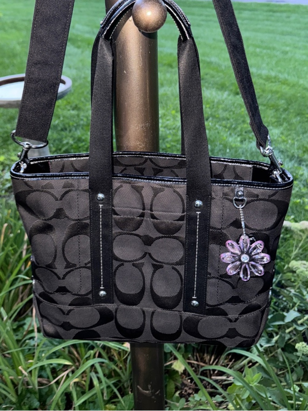 Coach Black Signature Jacquard Shoulder Bag with Purple Flower Charm